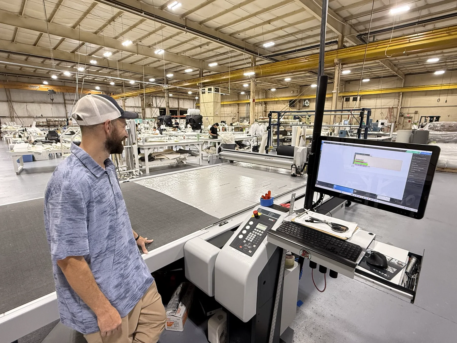 Blue Core Craft technician developing a precision-cut pattern